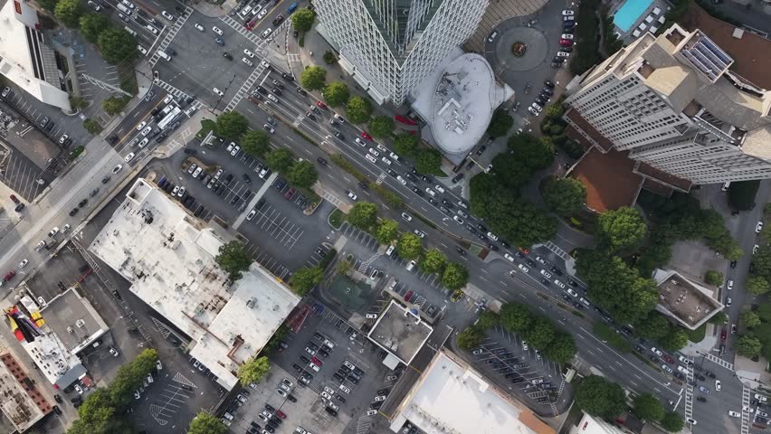 High angle view of skyscraper and busy street of Buckhead, Air conditioner exhaust vents at rooftops of skyline buildings, Atlanta, Georgia, USA