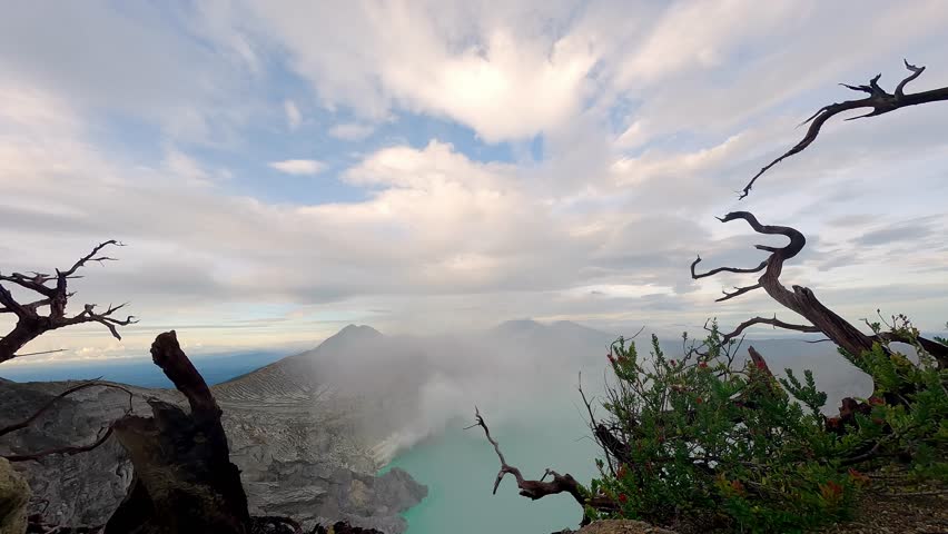 Colored lake in the mouth of a volcano in Indonesia