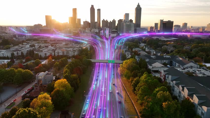 Animated glowing fiber optic streams over highway showing global internet connectivity in USA city during sunset. 3D render over Atlanta cityscape. Royalty-Free Stock Footage #3420088317