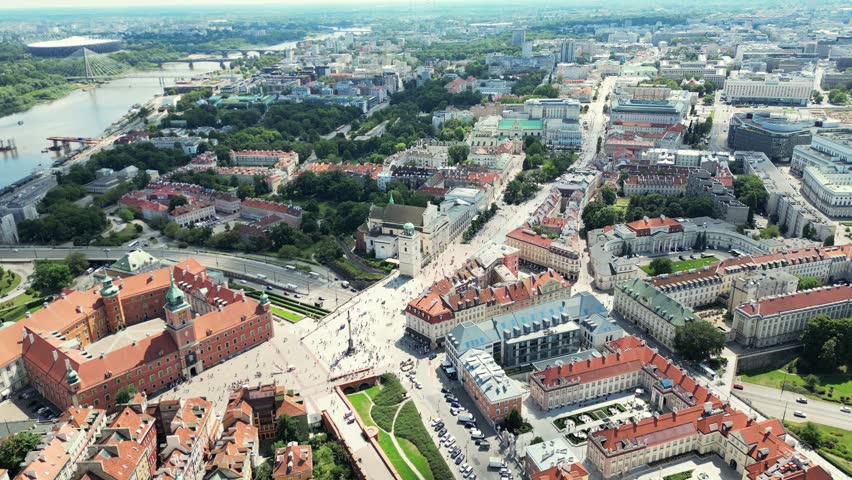 Warsaw Old town and modern skyscrapers. Old buildings and a church in the old town of Warsaw, Poland. Aerial view of the Warszawa cityscape with historic buildings, market square, Cathedral