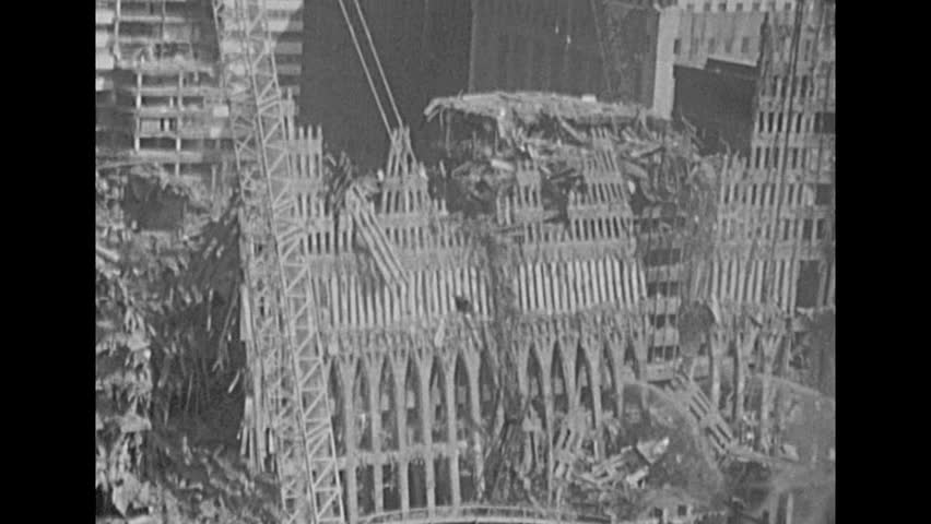 Construction equipment amid the wreckage of the World Trade Center, in New York City, New York, USA, September 11, 2001. This footage was filmed with a super 8 film camera from a rooftop at Prince