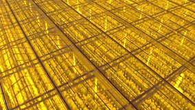 Top view of roofs of large greenhouse complexes for growing vegetables, fruits and cannabis herbs. Camera rule 180 around the glass roofs of greenhouses with the warm light on at night. - Powered by Shutterstock - Get 15% off with code: PIKWIZARD15