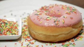 Pink Donut turning around (loopable HD video)