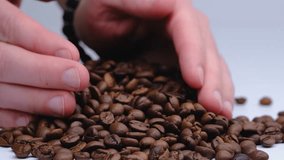 coffee beans and hands close-up video