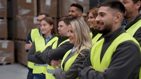 Full team of warehouse employees standing in warehouse. Team of workers in modern industrial factory industry, manufactrury. - Powered by Shutterstock - Get 15% off with code: PIKWIZARD15