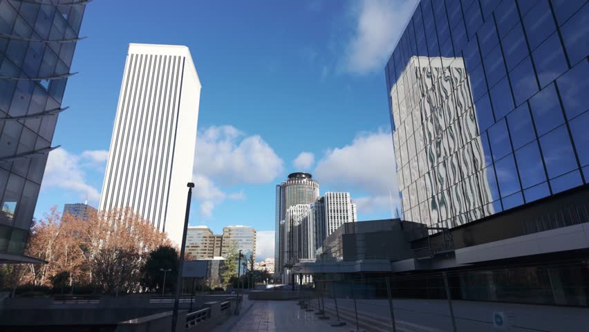 Modern skyscraper buildings headquarters of multinationals in the financial district of Madrid, Spain.
