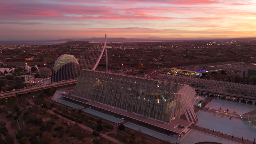 The fading sunset sky casts a spectrum of colors over Valencia