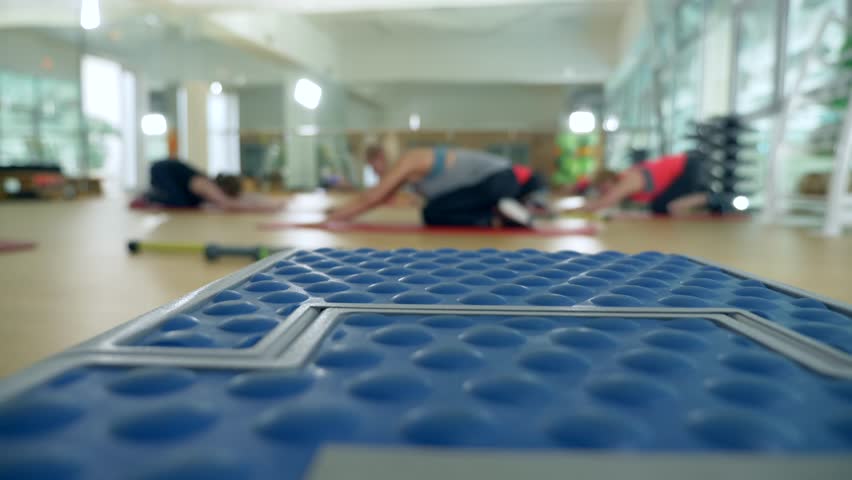 Fitness class in the gym. women are engaged in power training. group training. blur. 4k, unrecognizable people | Shutterstock HD Video #34207105