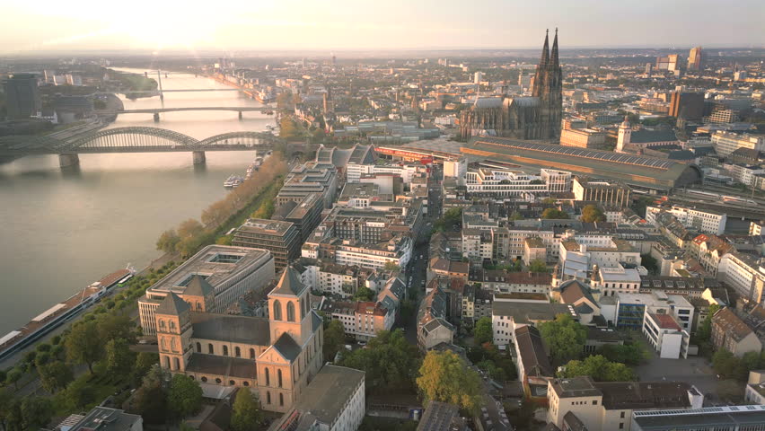 Cologne city germany aerial skyline tp view fly over cologne old town in front cologne cathedral river and bridge in old town.