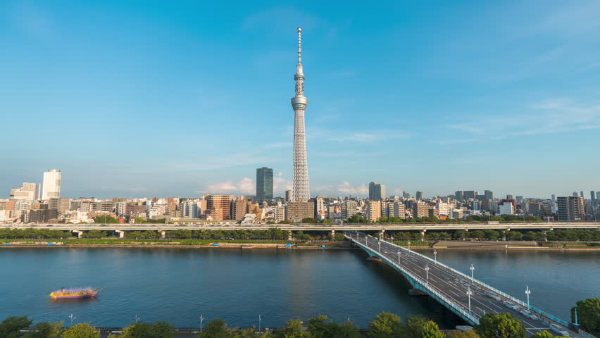 Aerial view time lapse 4k Video of Tokyo sky tree and Tokyo city from sunset to sunrise, day to night to day again, at Tokyo, Japan. 