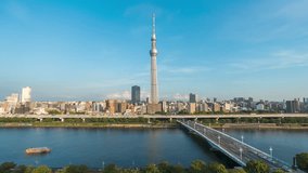 Aerial view time lapse 4k Video of Tokyo sky tree and Tokyo city from sunset to sunrise, day to night to day again, at Tokyo, Japan. 