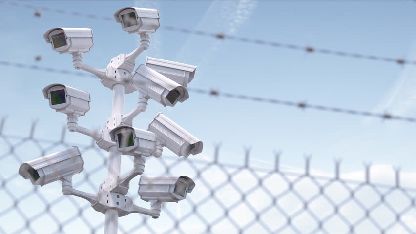 CCTV secutity cameras system and barbed wire fence. Privacy, security and protection Royalty-Free Stock Footage #3421175661