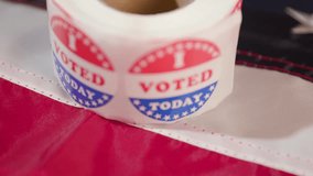 I voted today stickers on US flag - Powered by Shutterstock - Get 15% off with code: PIKWIZARD15