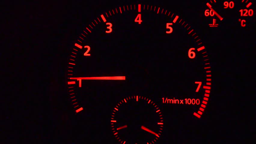 Car tachometer and moving pointer on it indicating the varying engine RPM. HD. 