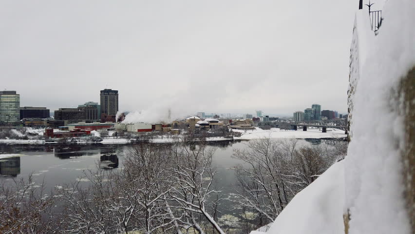 Panoramic view from Parliament Hill on the Ottawa River and downtown Ottawa, Ontario, Canada in winter day.