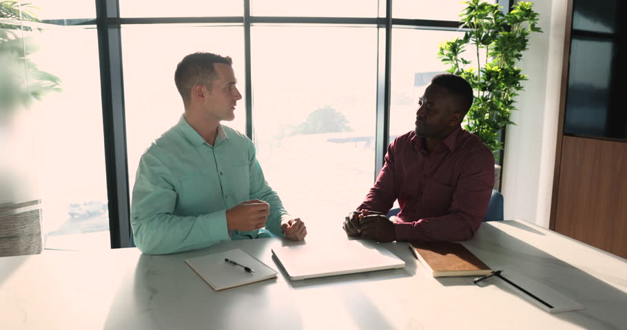 African and European businessmen shake hands, make commercial deal, buy or sell company services, conclude agreement. Accomplish successful meeting, job interview. Human resource, finish job interview Royalty-Free Stock Footage #3421318891