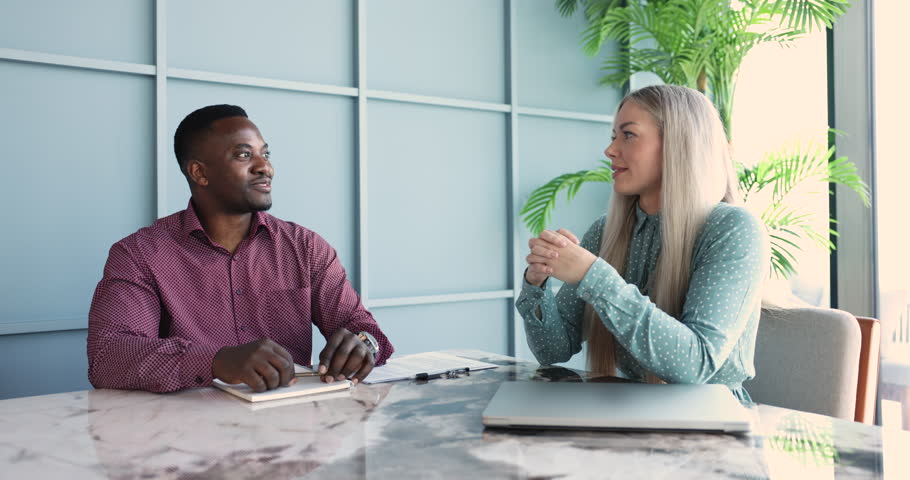 Two happy successful businesspeople shake hands finish formal meeting in company office. Make commercial deal feel satisfied with negotiations, handshake as symbol of business partnership and trust Royalty-Free Stock Footage #3421344377