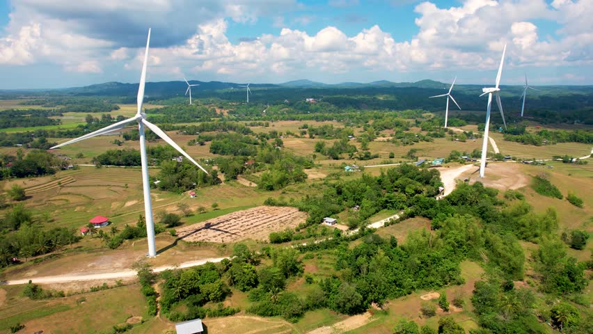 View of San Lorenzo Wind Farm in the island province of Guimaras, Philippines. Wind renewable energy in the visayas region. Royalty-Free Stock Footage #3421391071
