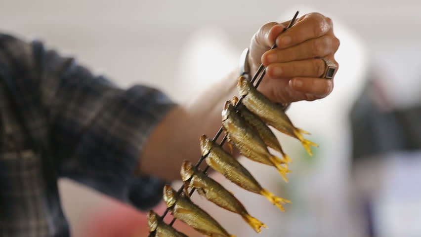 Smoked fish at market, local cuisine, fishermen selling their catch, Black Sea
