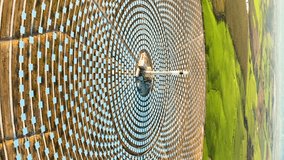 Aerial view of solar Plant in Seville, Spain. Renewable energy. Aerial vertical, vertical video background.