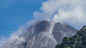 Turgo, Indonesia -  December 15. 4K Timelapse of Mount Merapi Erupting in the Morning. Mount Merapi several times issued lava and Volcano-Pyroclastic Flow 