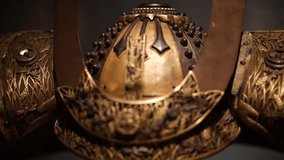 Close-Up of Golden Helmet on Black Background - Powered by Shutterstock - Get 15% off with code: PIKWIZARD15