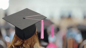 Aerial view of graduates wearing caps and gowns Congratulated the graduates in University Rear view of the university graduates in graduation gowns and caps - Powered by Shutterstock - Get 15% off with code: PIKWIZARD15