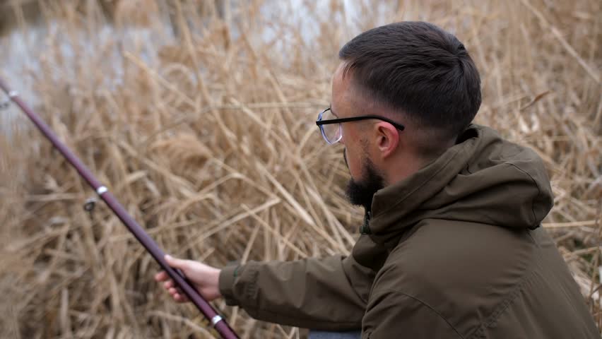 The fisherman folds the rod as there is no catch