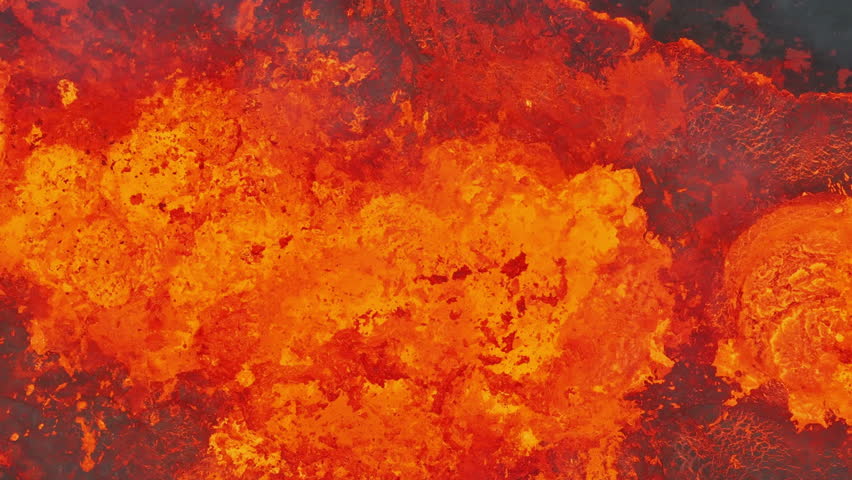 Close up view of active volcanic crater eruption. Hot lava and magma splashing out of crater. Tourist attraction in Iceland Litli-Hrútur eruption 2023. Beautiful and dangerous disaster. Royalty-Free Stock Footage #3422405185