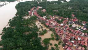 Aerial footage of villages and residents houses being submerged by overflowing rivers which resulted in flooding in Musi Rawas Utara, South Sumatra, Indonesia 4K Drone Video | Banjir Musi Rawas Utara