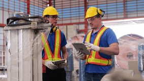 Professional engineer and young trainee technician holding tablet wearing safety uniforms workwear Inspection and maintenance planning the machinery in heavy industrial manufacturer factory.	 - Powered by Shutterstock - Get 15% off with code: PIKWIZARD15