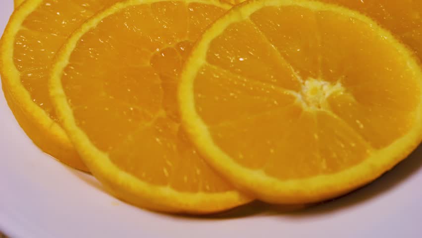 Orange slices on a plate. Close up.