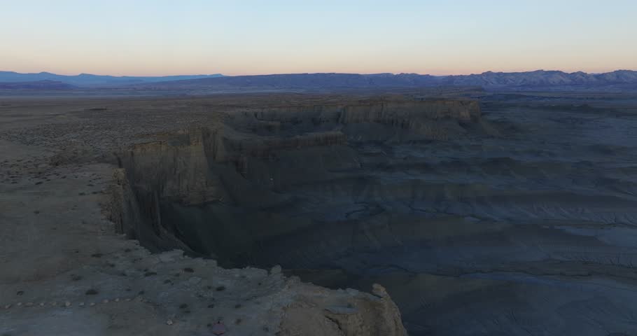 Moonscape Overlook or Skyline View at sunset with Factory butte massif in background, Utah in USA. Aerial circling