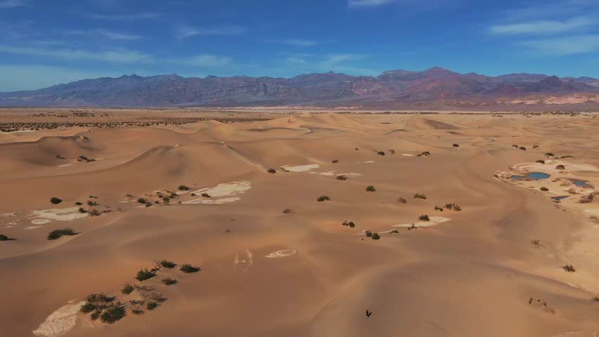 Desert sand dune in Death Valley National Park in Nevada and California, scenic landscape nature. Hot and dry tourist attraction.