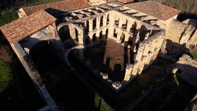 Aerial view of the ruins of an ancient abandoned monastery in Santa Maria de rioseco, Burgos, Spain. High quality 4k footage