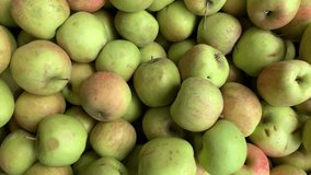4k video of group of green apples in a local market. Food and fruit concept.