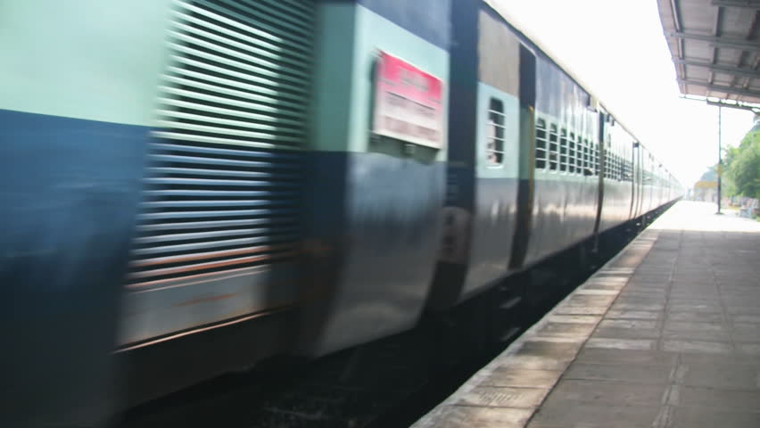 Express passenger train passes through Chiluvur station near Vijayawada, Andra Pradesh, India.