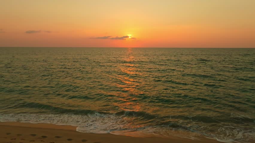 Nature beach sea sunset background,Waves crashing on sandy shore beautiful light sunrise nature landscape background