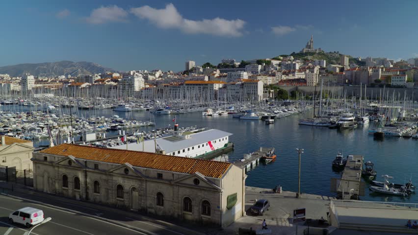 Old harbor of Marseille with a view of the Basilica and all the boats in the city center