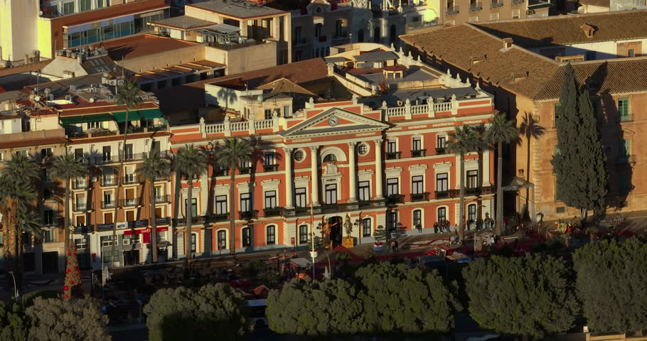 Aerial view of centre of european city Murcia, Spain. Establishing aerial shot of center of city. Spanish tourist city not far from the sea. Sunset