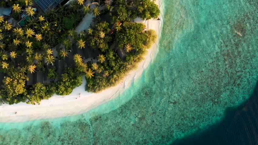 White sand and blue ocean from air. Tropical island. 