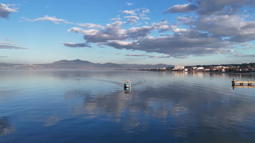 Aerial video of a small fisherman boat in the Aegean sea near Thessaloniki, in Peraia