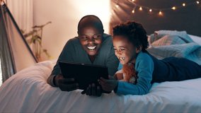 Night, tablet and father and son on a bed with cartoon, movie or streaming funny video at home. Digital, app and black dad with kid in a bedroom for online comic, love and bonding in a house together