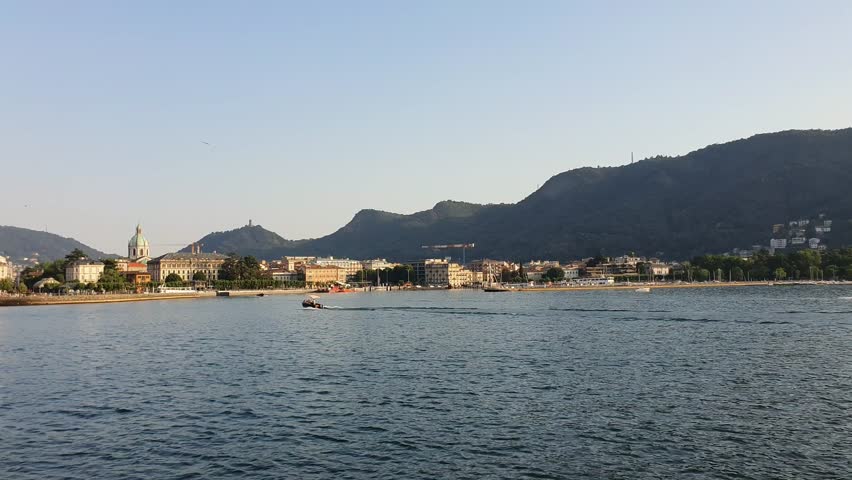 Beautiful view of Lake Como in Italy with the city of Como in the background.