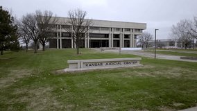 State of Kansas Judicial Center and Kansas Supreme Court building in Topeka, Kansas with drone video moving in at an angle.