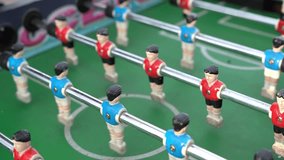 Close-up of figures of plastic players in a football match. - Powered by Shutterstock - Get 15% off with code: PIKWIZARD15