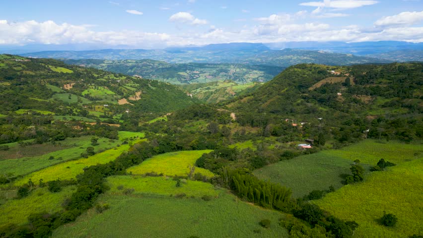 
Aerial vistas unveil Colombia's Andes: majestic peaks and verdant valleys create a stunning panorama of this South American mountain range. Royalty-Free Stock Footage #3424064711