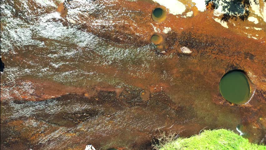 Aerial view of the natural reserve of wells, Las Gachas in Guadalupe, Santander, Colombia, South America.

A beutiful view of a river full of puddles