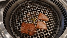 Charcoal grilled Kobe Wagyu beef sliced Yakiniku - 4k video