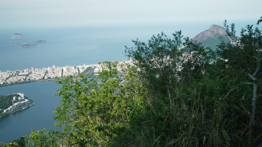City of Rio de Janeiro - a panoramic view from the statue of Christ Redeemer at the top of Corcovado Mountain with Guanabara Bay in the background.